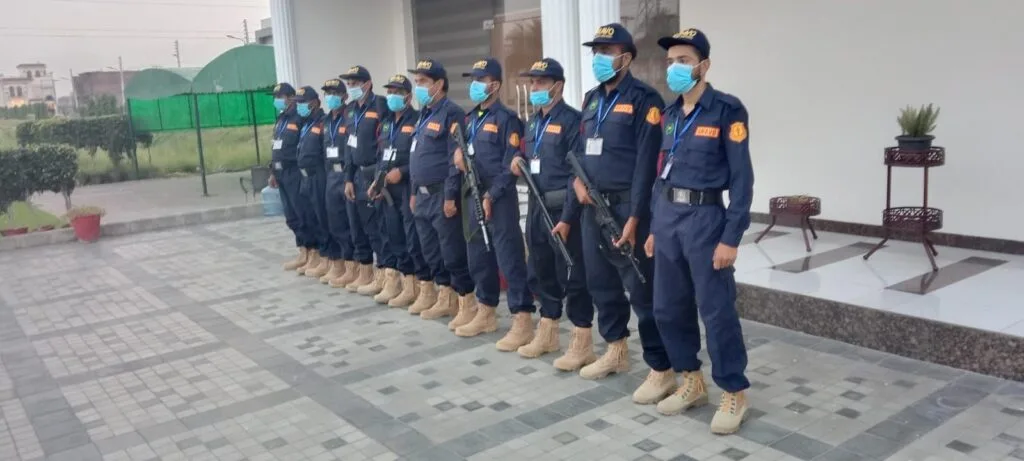 Event security team managing crowd control at a corporate event in Lahore
