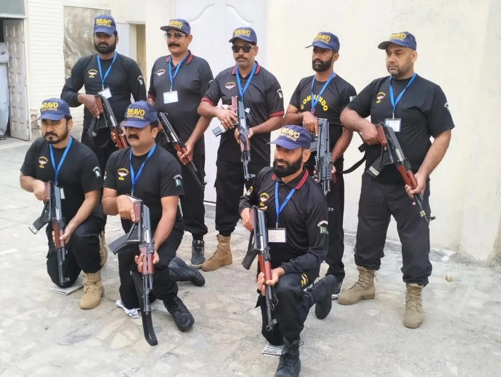Elite close protection officers escorting a client in Lahore
