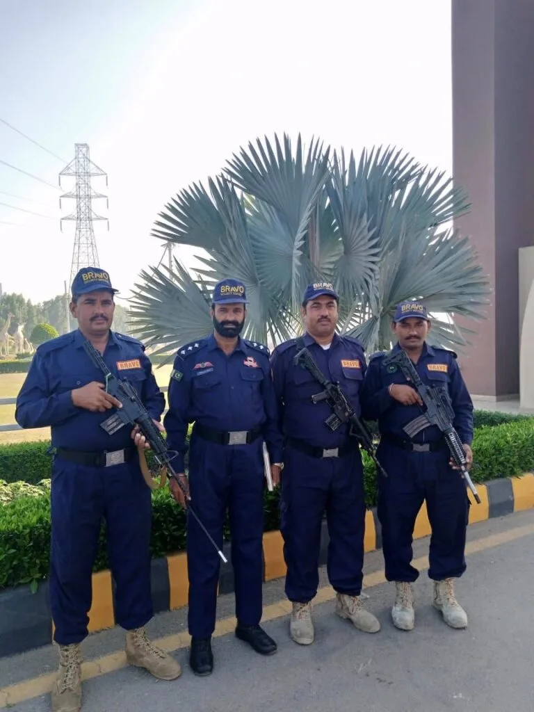 Corporate security guard stationed at an office building in Lahore